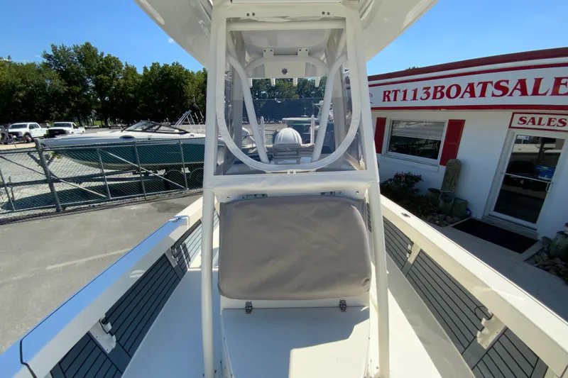 Slide: The Image of 2025 Pathfinder 2600 TRS boat at dealership, showcasing sleek design and modern features. - 42