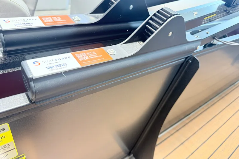 Slide: The Image of 2027 Bentley Pontoons Elite 223 Swingback Bench with SureShade 1000 Series power bimini. - 13