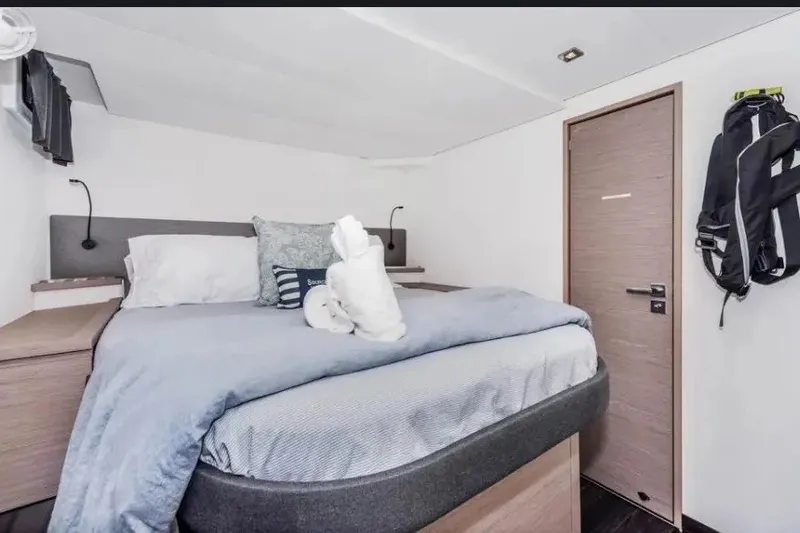 Slide: The Image of Luxurious cabin interior of 2021 Fountaine Pajot SABA 50 yacht with cozy bedding. - 36