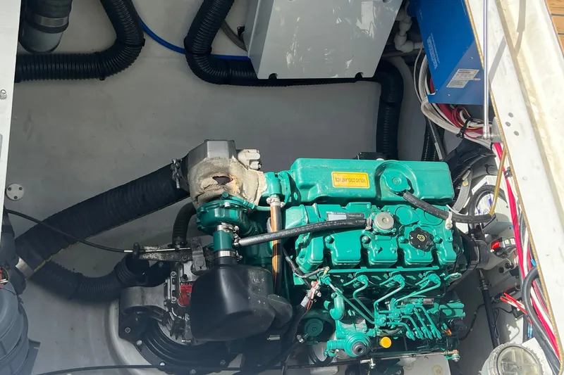 Slide: The Image of Engine compartment of a 2021 Fountaine Pajot SABA 50 catamaran, featuring a Volvo Penta engine. - 126