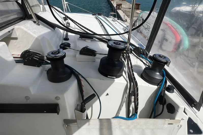 Slide: The Image of Deck view of 2021 Fountaine Pajot SABA 50 catamaran with winches and ropes. - 50