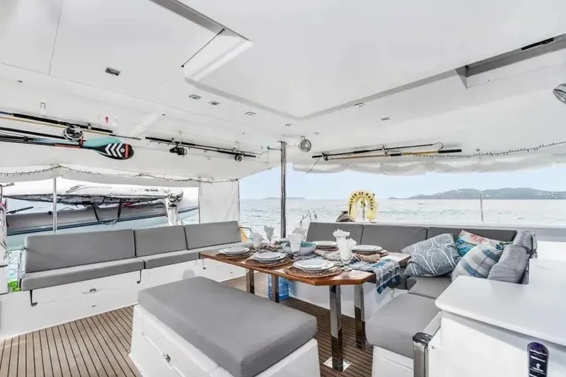 Slide: The Image of Luxurious 2021 Fountaine Pajot SABA 50 yacht interior with elegant dining setup and ocean view. - 39