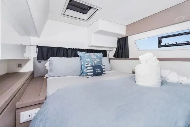 Slide: The Image of Luxurious cabin interior of 2021 Fountaine Pajot SABA 50 catamaran, featuring cozy bedding. - 38