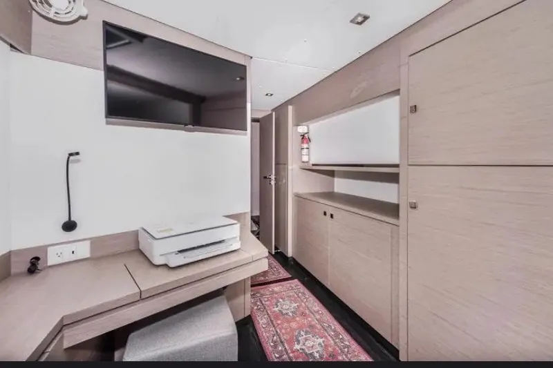 Slide: The Image of Modern interior of 2021 Fountaine Pajot SABA 50 yacht with TV and printer. - 51