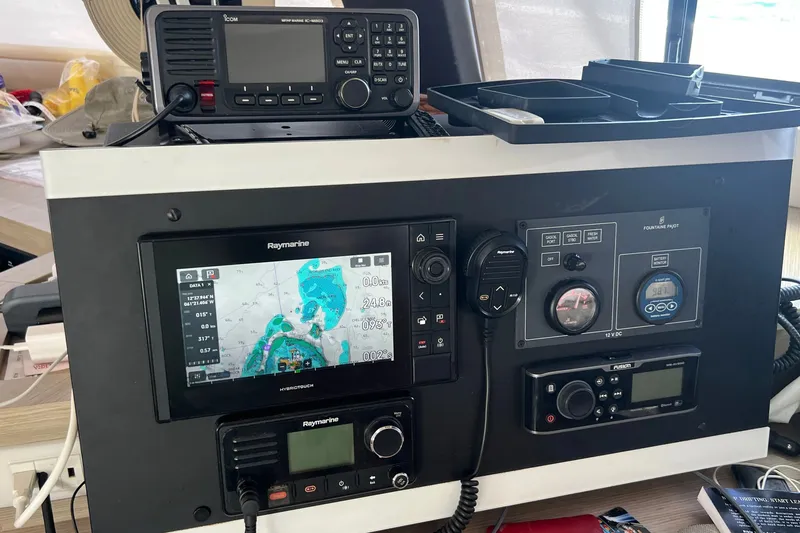 Slide: The Image of Control panel of a 2021 Fountaine Pajot SABA 50 catamaran with navigation and communication equipment. - 43