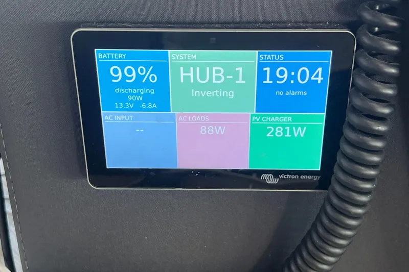 Slide: The Image of Display screen on 2021 Fountaine Pajot SABA 50 showing battery and system status. - 110
