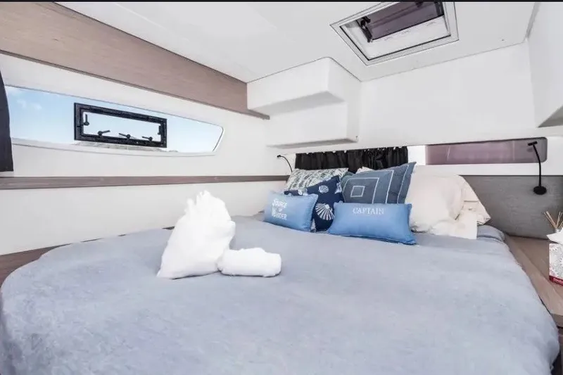 Slide: The Image of Luxurious cabin interior of 2021 Fountaine Pajot SABA 50 catamaran with elegant bedding. - 37