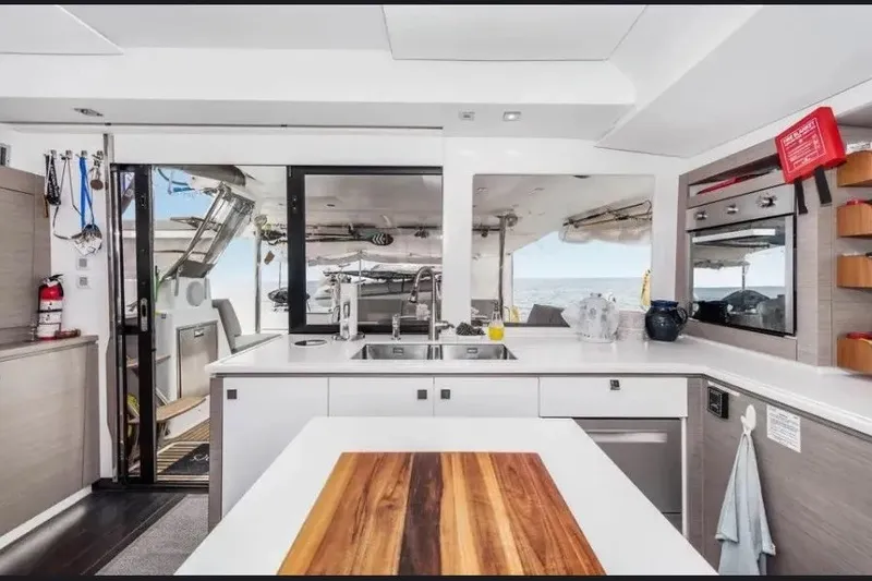 Slide: The Image of Modern kitchen interior of 2021 Fountaine Pajot SABA 50 catamaran with ocean view. - 22
