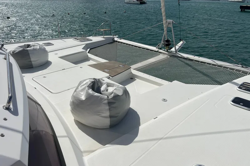 Slide: The Image of Luxurious 2021 Fountaine Pajot SABA 50 catamaran deck with bean bags and ocean view. - 17