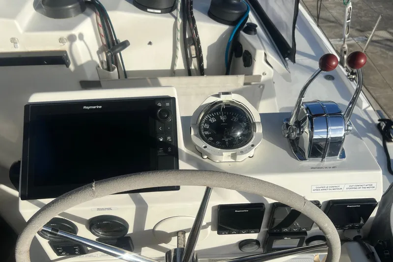 Slide: The Image of Helm of 2021 Fountaine Pajot SABA 50 with navigation instruments and controls. - 47
