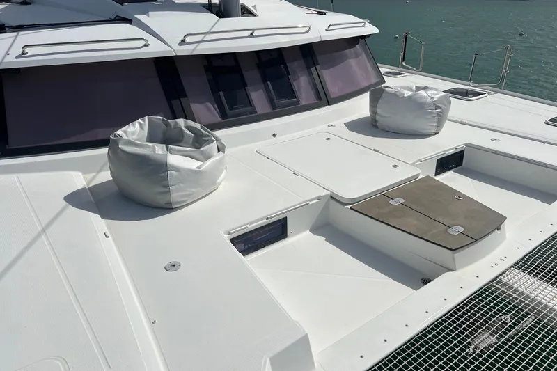 Slide: The Image of Deck of 2021 Fountaine Pajot SABA 50 catamaran with bean bags and hatches. - 14