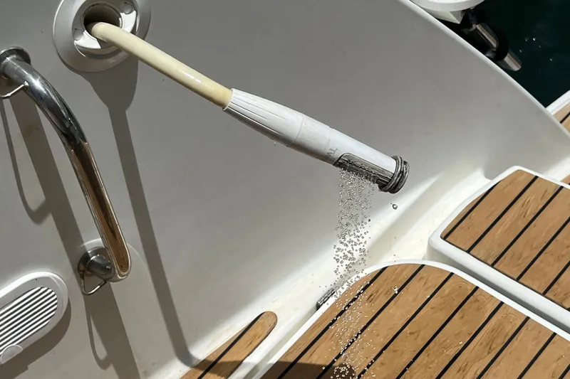 Slide: The Image of Outdoor shower on 2021 Fountaine Pajot SABA 50 yacht with teak decking. - 65