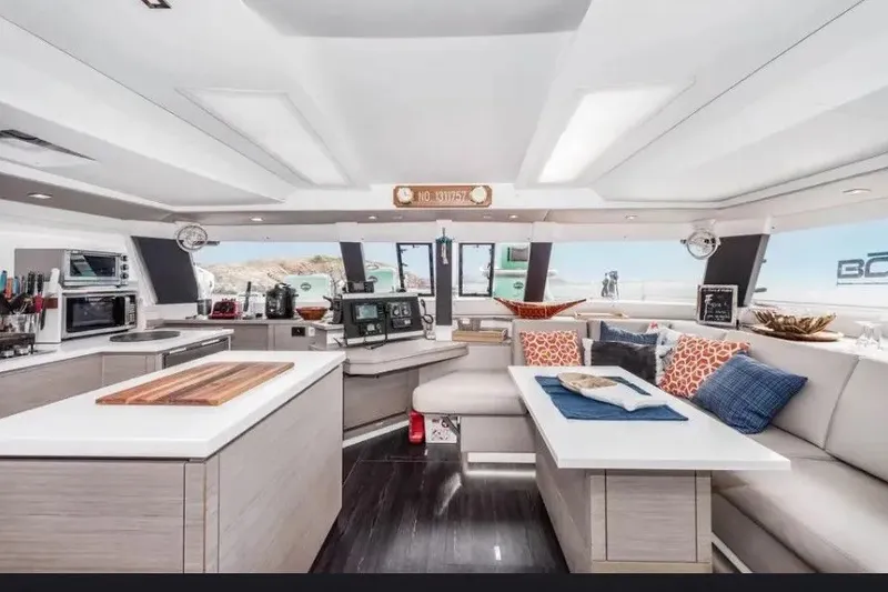 Slide: The Image of Luxurious interior of 2021 Fountaine Pajot SABA 50 catamaran with modern kitchen and seating area. - 48
