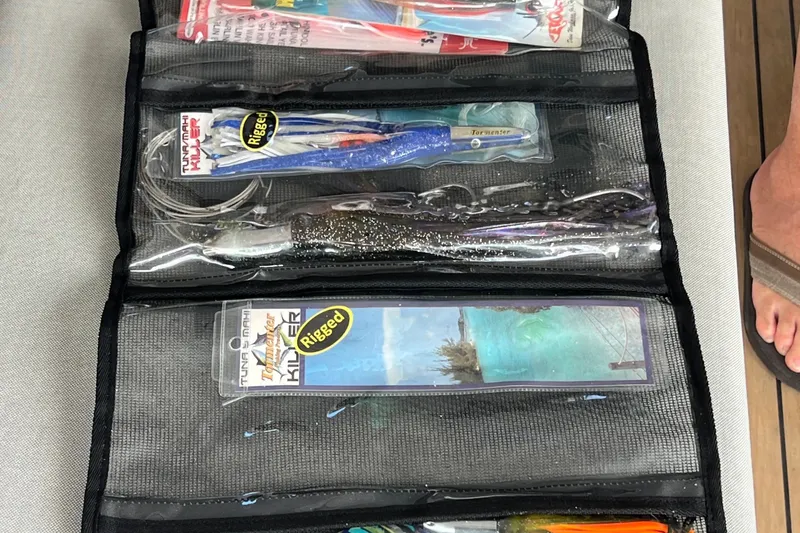 Slide: The Image of Fishing lures in a tackle organizer on a Fountaine Pajot SABA 50 yacht. - 64
