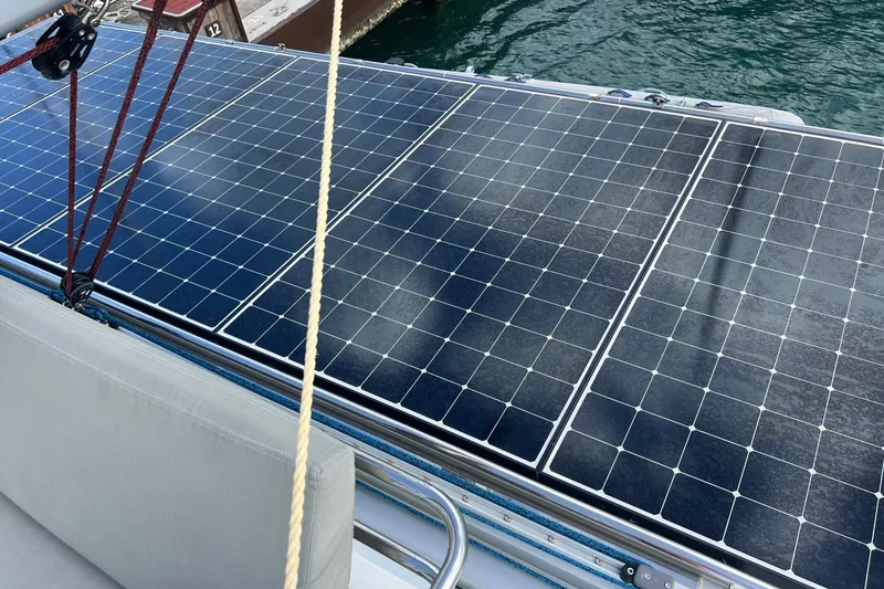 Slide: The Image of Solar panels on 2021 Fountaine Pajot SABA 50 catamaran, docked by the water. - 125