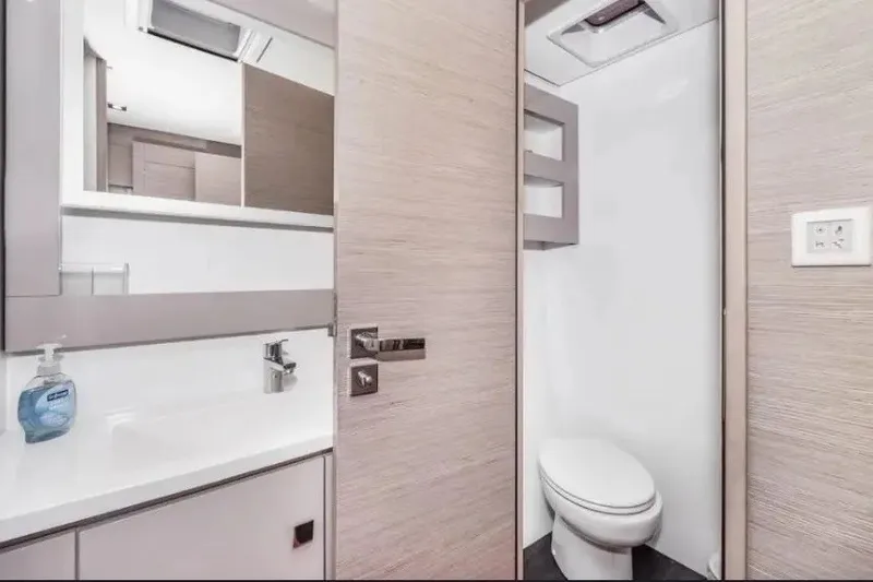 Slide: The Image of Modern bathroom interior on 2021 Fountaine Pajot SABA 50 yacht, featuring sleek design and fixtures. - 30