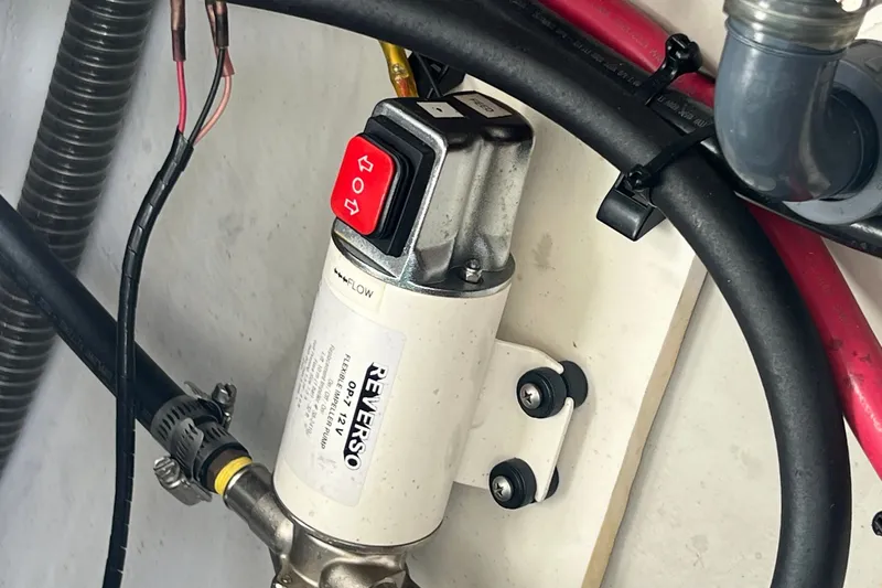 Slide: The Image of Reverso fuel pump in a 2021 Fountaine Pajot SABA 50 yacht engine room. - 124