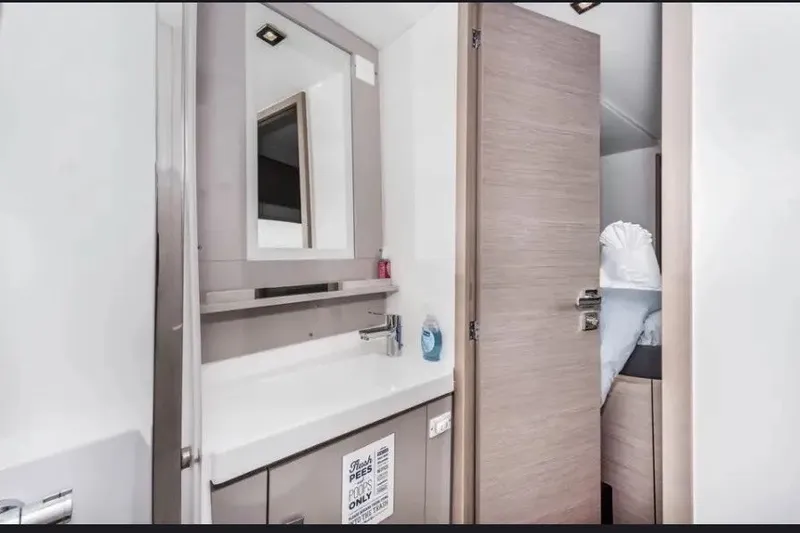 Slide: The Image of Modern bathroom interior on 2021 Fountaine Pajot SABA 50 yacht, featuring sleek design elements. - 34