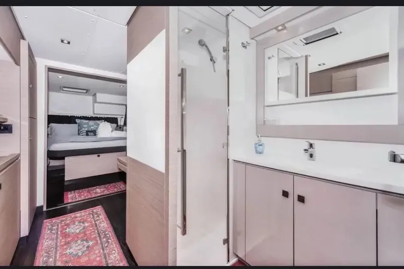 Slide: The Image of Luxurious interior of 2021 Fountaine Pajot SABA 50 yacht, featuring modern bathroom and cozy bedroom. - 31