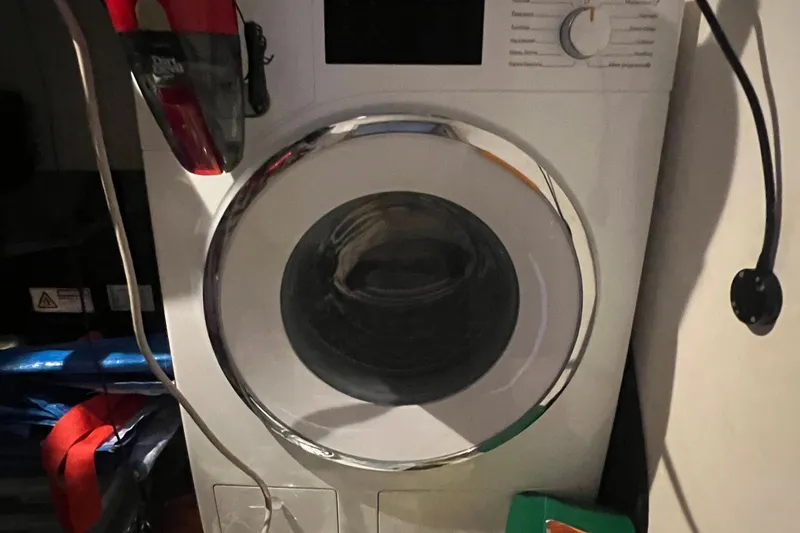 Slide: The Image of Washing machine inside a 2021 Fountaine Pajot SABA 50 yacht cabin. - 71