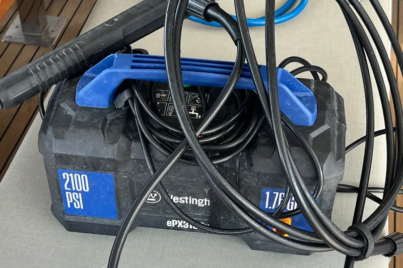 Slide: The Image of High-pressure washer with 2100 PSI and 1.76 GPM on a Fountaine Pajot SABA 50 yacht. - 91