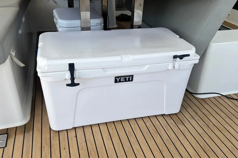 Slide: The Image of YETI cooler on Fountaine Pajot SABA 50 yacht, 2021 model, with teak deck flooring. - 107