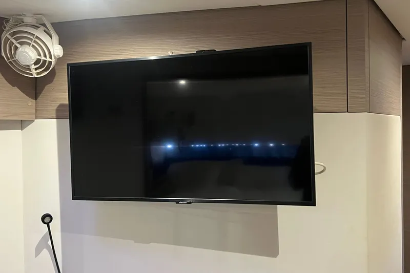 Slide: The Image of Flat-screen TV mounted on a Fountaine Pajot SABA 50 yacht interior, 2021 model. - 60