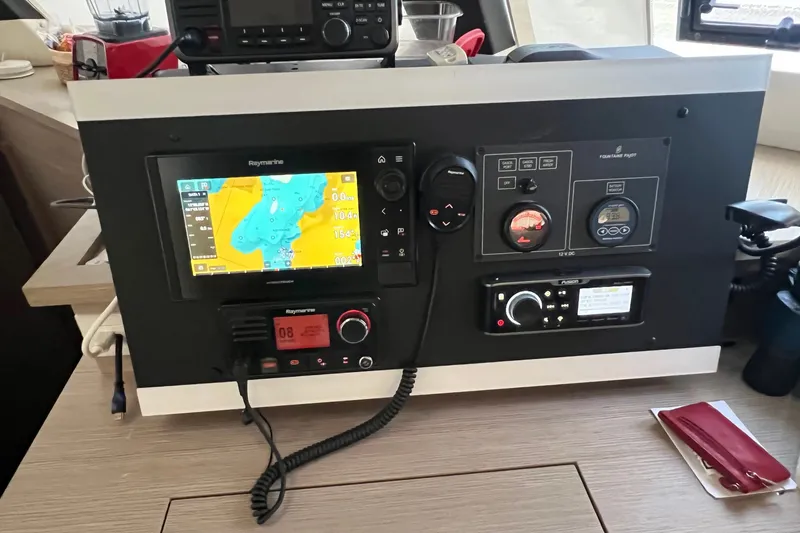 Slide: The Image of Control panel of a 2021 Fountaine Pajot SABA 50 catamaran with navigation equipment. - 104