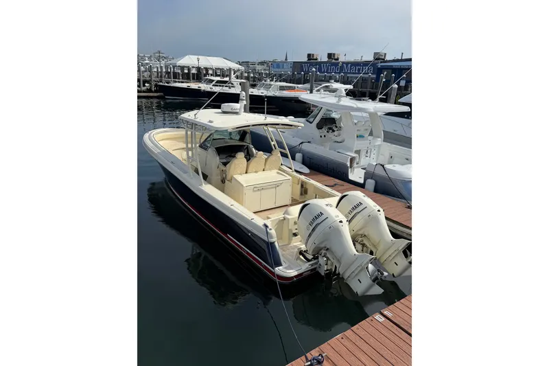 The Image of 2017 Chris-Craft Catalina 34 boat docked at marina with twin Yamaha engines. - 2