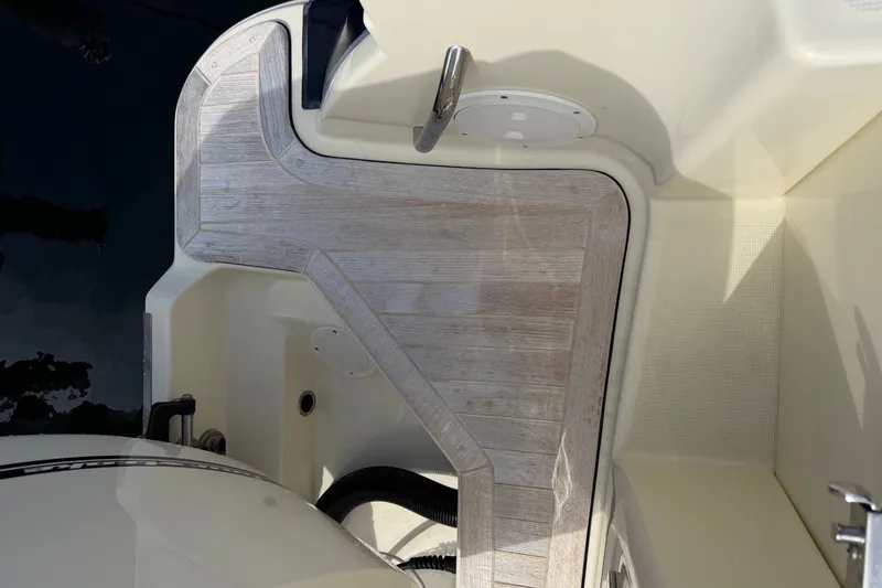 Slide: The Image of 2017 Chris-Craft Catalina 34 boat deck with wood finish and sleek design. - 47