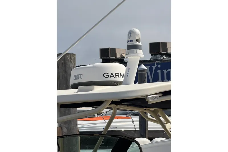Slide: The Image of 2017 Chris-Craft Catalina 34 with Garmin xHD radar and FLIR camera on deck. - 50