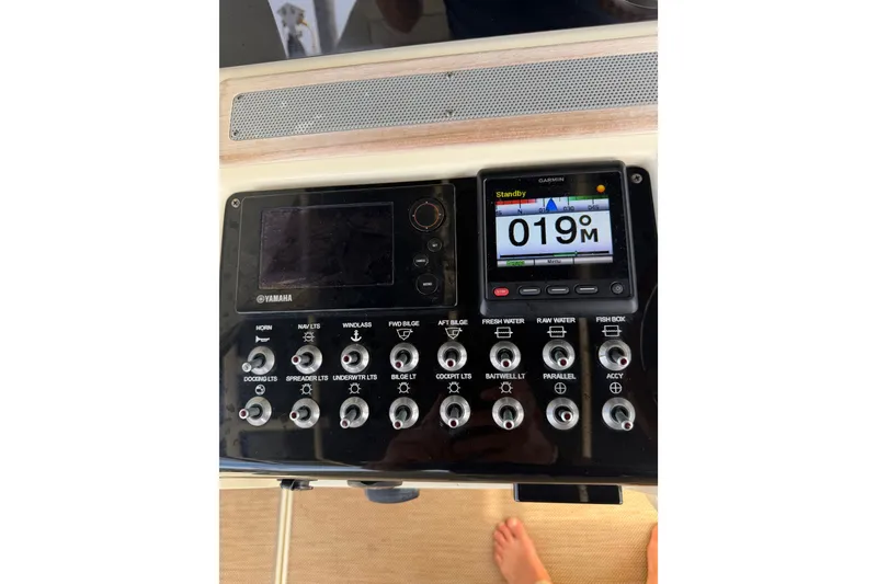 Slide: The Image of Control panel of a 2017 Chris-Craft Catalina 34 boat with Yamaha and Garmin displays. - 35