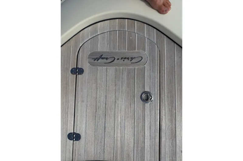 Slide: The Image of Wooden deck hatch on a 2017 Chris-Craft Catalina 34 boat. - 32