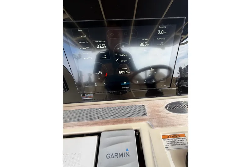 Slide: The Image of Dashboard of 2017 Chris-Craft Catalina 34 boat with Garmin display and controls. - 42