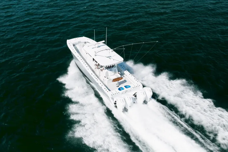 Slide: The Image of Aerial view of 2024 Freeman 43 boat speeding on open water. - 33