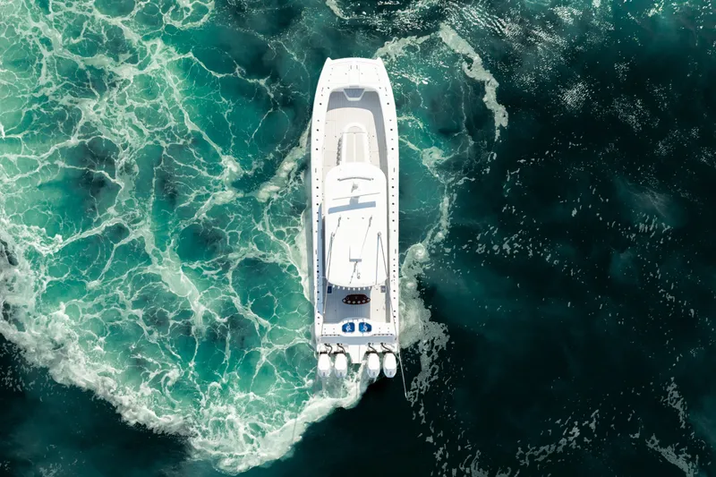 Slide: The Image of Aerial view of 2024 Freeman 43 boat navigating through turquoise ocean waters. - 35