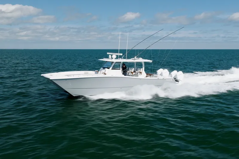 The Image of 2024 Freeman 43 boat cruising on open ocean under clear skies. - 0