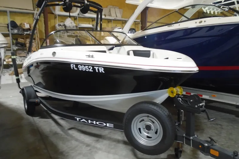 The Image of 2023 Tahoe 185 S boat on trailer in storage facility. - 0