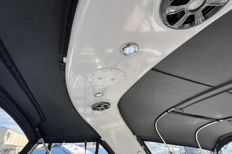 Slide: The Image of Interior view of 2006 Four Winns 348 Vista boat with speakers and lighting. - 19
