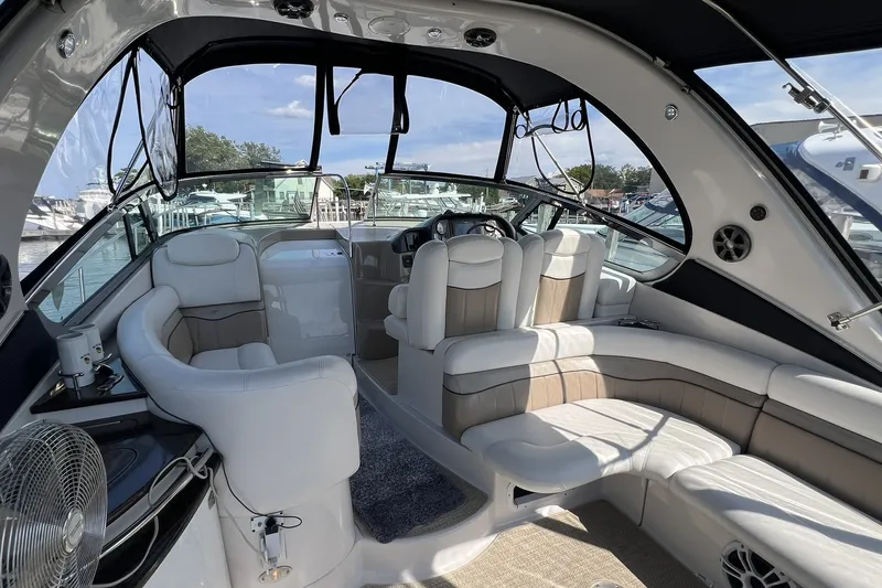 Slide: The Image of Luxurious 2006 Four Winns 348 Vista yacht interior with plush seating and modern design. - 2