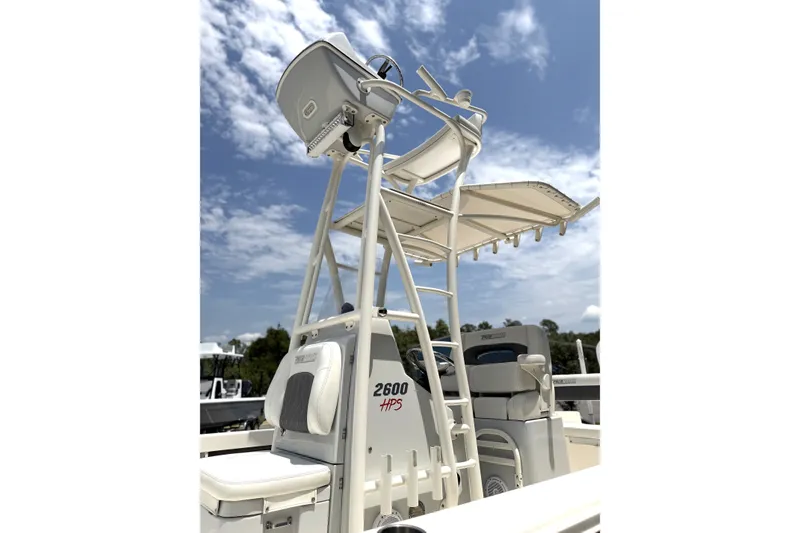 Slide: The Image of 2022 Pathfinder 2600 HPS boat with tower under a clear blue sky. - 3