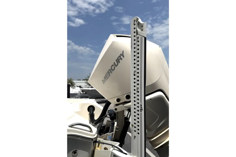 Slide: The Image of 2022 Pathfinder 2600 HPS boat with Mercury engine under clear sky. - 8