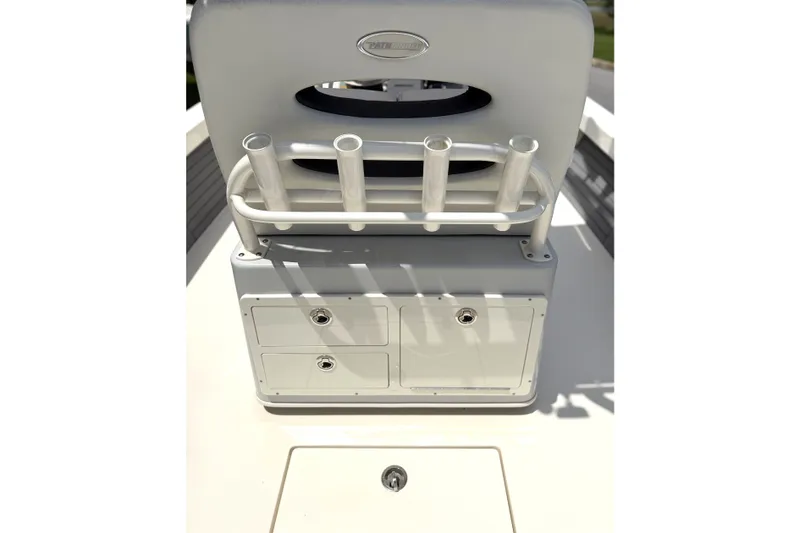 Slide: The Image of 2022 Pathfinder 2600 HPS boat console with rod holders and storage compartments. - 10