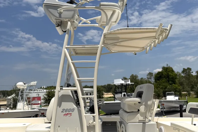 Slide: The Image of 2022 Pathfinder 2600 HPS boat with elevated seating and clear sky background. - 4