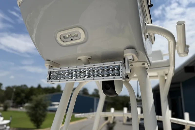 Slide: The Image of 2022 Pathfinder 2600 HPS boat with mounted LED light bar under clear sky. - 15