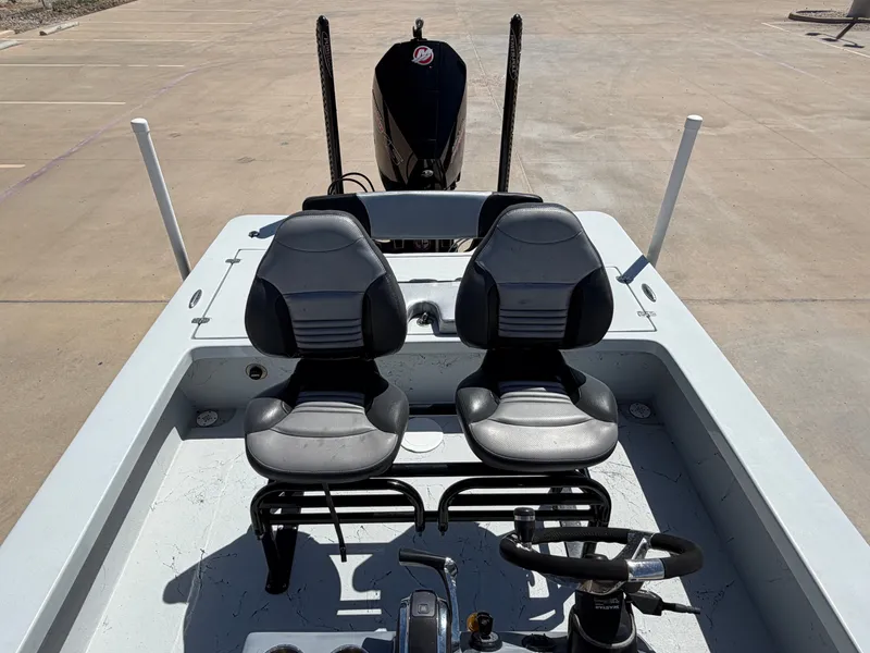 Slide: The Image of The image shows the cockpit of a 2023 Blazer Bay 2220 GTS with two black seats. - 22
