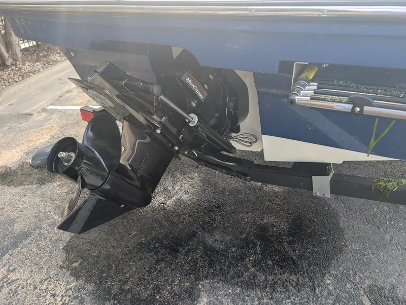Slide: The Image of The image shows the outboard motor of a 2023 Bayliner VR4 Bowrider. - 3