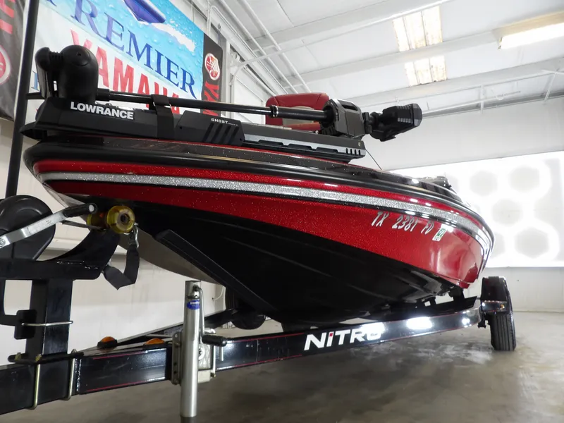 Slide: The Image of 2010 Nitro Z-7 boat on a trailer in a showroom. - 9