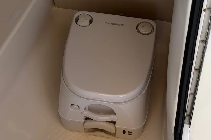 Slide: The Image of Portable toilet in 2003 Chaparral Sunesta 263 boat cabin. - 31
