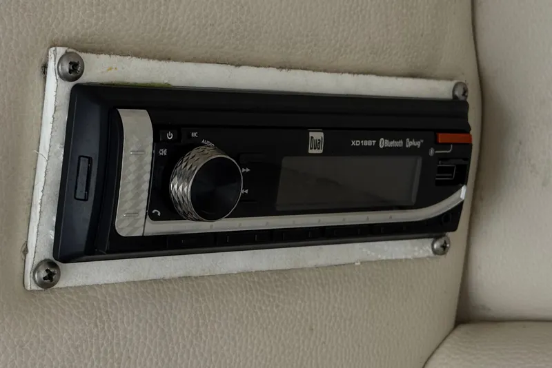 Slide: The Image of 2003 Chaparral Sunesta 263 boat stereo system, featuring Dual XD18BT with Bluetooth connectivity. - 32